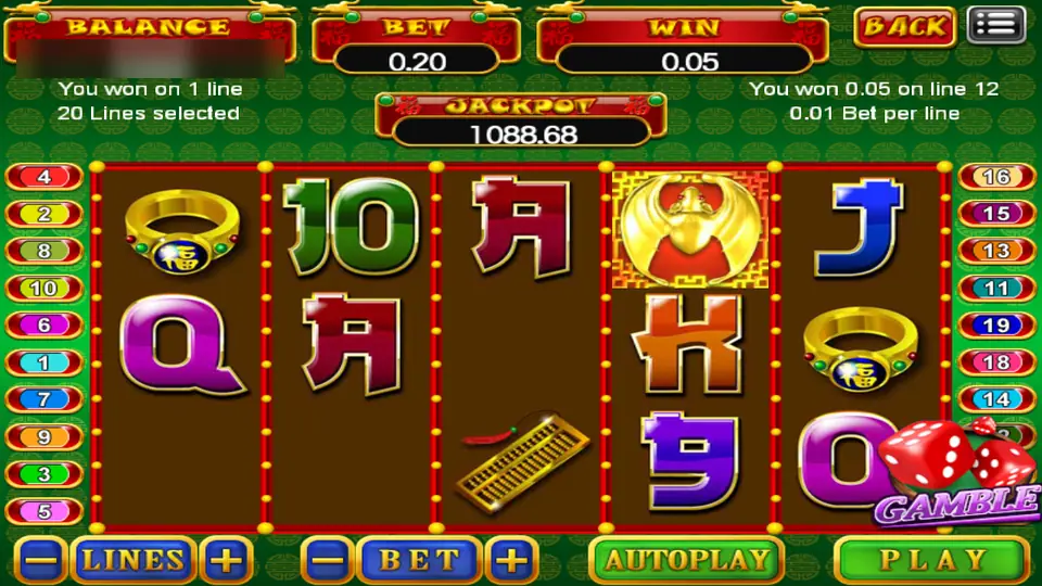 Fortune spin paying 0.05 on line 12, with gold rings, an abacus and the GAMBLE dice in the corner