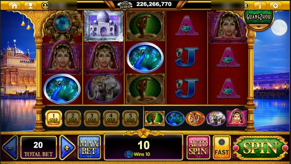 The Taj Majestic with veiled women on reels 1 and 2, peacocks, cobras and a win of 10 on a bet of 20